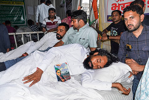 Student leader Devendra Nath Mahto during his indefinite hunger strike as part of a protest against the Jharkhand government over alleged irregularities in the 14th JPSC examination, JSSC-CGL and other recruitment tests, demanding a CBI probe and reforms in the recruitment agencies, at Jaipal Singh Munda Stadium, in Ranchi, Jharkhand.