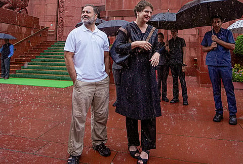 LoP in Lok Sabha Rahul Gandhi, left, with Congress MP Priyanka Gandhi Vadra during the Monsoon session of Parliament, amid rainfall, in New Delhi.