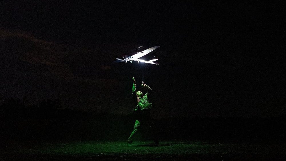 A Ukrainian serviceman with the Safari Unit of the Liut Brigade launches a reconnaissance drone at the frontline in the Donetsk region  - | Photo: AP/Vasilisa Stepanenko, File