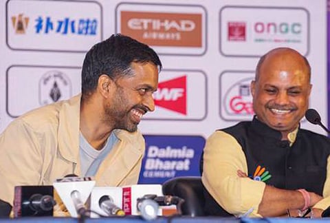 Indian National Team Chief National Coach Pullela Gopichand, left, and Badminton Association of India (BAI) General Secretary Sanjay Mishra during the Draw Ceremony of the 30th BWF World Championships, in New Delhi, Wednesday, Aug. 5, 2026. 