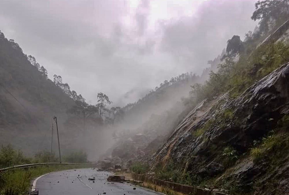 Weather: Debris block a road