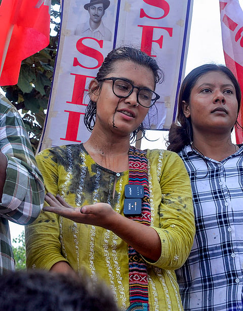 All India Student's Association (AISA) National President Neha Bora after a man threw ink on her during a protest against the alleged irregularities of examinations conducted by Jharkhand Public Service Commission (JPSC) and Jharkhand Staff Selection Commission (JSSC), in Ranchi.
