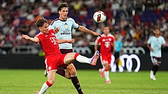 Aston Villa's Victor Lindelöf, right, fights for the ball with FC Bayern's Tim Binder during a pre-season friendly soccer match between FC Bayern and Aston Villa at the Audi Football Summit held at the Kai Tak Stadium in Hong Kong, Friday, Aug. 7, 2026 - (AP Photo/Chan Long Hei)
