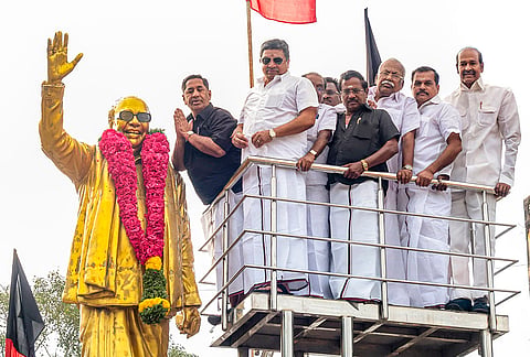 DMK leaders pay tribute to the statue of late party leader M Karunanidhi during a peace rally on the late leader's death anniversary, in Madurai, Tamil Nadu.