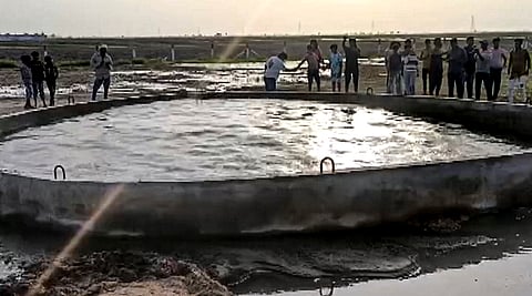 People gather after the water in an 18-foot-deep farm well seen continuously moving and creating wave-like ripples on its own, at Virparda village in Morbi district, Gujarat. A team of experts has found that the mysterious ripples and continuous waves in a newly constructed well were likely caused by groundwater recharge and trapped air pressure following heavy rainfall. 