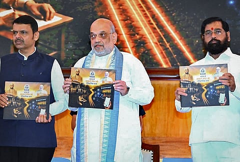 Union Home Minister Amit Shah along with Maharashtra Chief Minister Devendra Fadnavis and state Deputy CM Eknath Shinde release coffee table books titled ‘Operational Risk Management - A Practical Guide to Urban Co-operative Banks’ and ‘Historical Journey of Co-operative Banking, in Mumbai. 