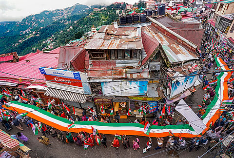 BJP workers carry a giant National Flag during 'Tiranga Yatra' procession ahead of the Independence Day celebrations, in Shimla, Himachal Pradesh. 