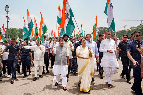 Delhi Chief Minister Rekha Gupta, BJP National President Nitin Nabin and others during the Tiranga Yatra, near Kartavya Path in New Delhi.
