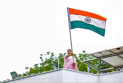 Delhi Chief Minister Rekha Gupta hoists the national flag as part of the 'Har Ghar Tiranga' campaign, at Chief Minister Jan Seva Sadan, in New Delhi. 