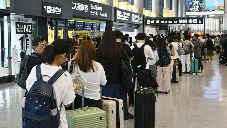Record Rain In Japan Leaves Thousands Stranded At Narita Airport - | Reuters