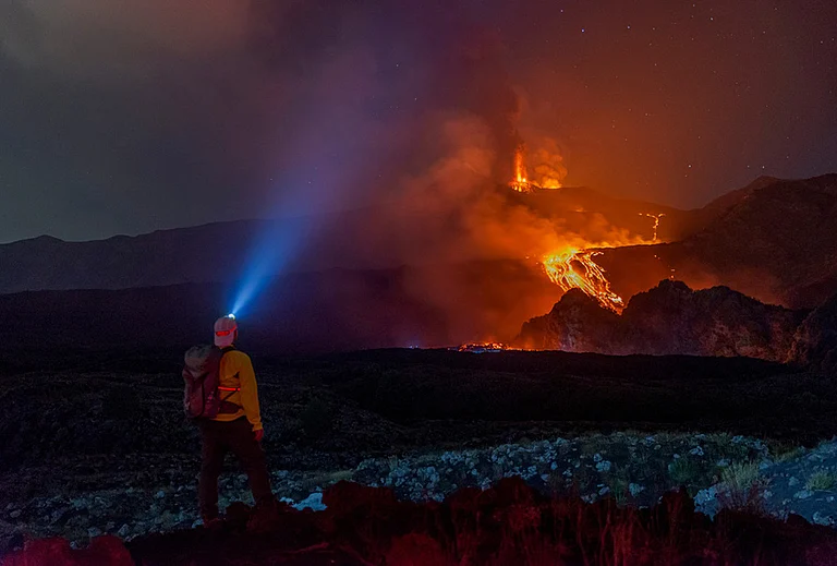 Eruptive activity continues on Mount Etna, where lava flows continue to descend on the slopes of the volcano, as seen from Mareneve near Catania, Italy, Thursday, Aug. 13, 2026. - | Photo: AP/Salvatore Allegra