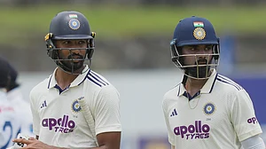 Eranga Jayawardena/AP Photo : India's Devdutt Padikkal, left, and KL Rahul leave the field for lunch break during the day one of the first cricket test match between Sri Lanka and India in Galle