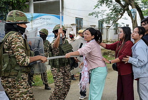 Members of the Justice and Fair Delimitation (JFD) Student Wing clash with security personnel as they try to storm the DM College of Teacher Education on the DM University campus, in Imphal, Manipur. The students were protesting to disrupt a training programme for census enumerators and supervisors. 