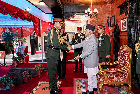Nepal President Ramchandra Paudel shakes hands with Indian Army Chief General Dhiraj Seth during an investiture ceremony at Rashtrapati Bhavan, in Kathmandu. President Paudel conferred the honorary rank of General of the Nepal Army on General Seth, continuing a bilateral tradition established in 1950. 