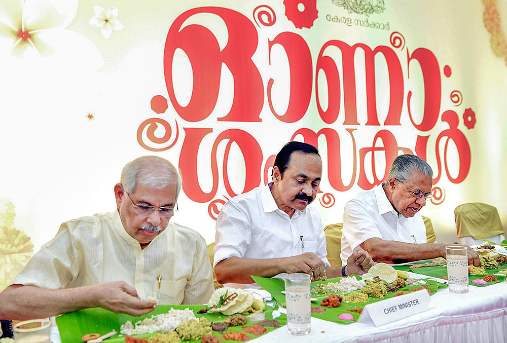 KL dignitaries take part in onasadhya