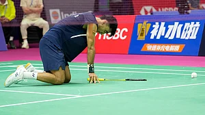 (AP Photo/Manish Swarup) : India's Lakshya Sen reacts as he plays against United States' Garret Tan during the Badminton World Championships in New Delhi, India, Wednesday, Aug. 19, 2026