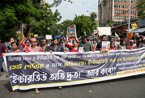 Primary school teachers participate in a rally over stalled recruitment process, in Kolkata, West Bengal.