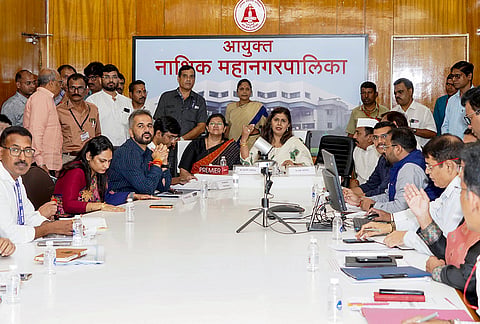 Maharashtra Environment and Climate Change Minister Pankaja Munde addresses officials and NMC Commissioner Manisha Khatri during a review meeting ahead of the Simhastha Kumbh Mela, in Nashik, Maharashtra.