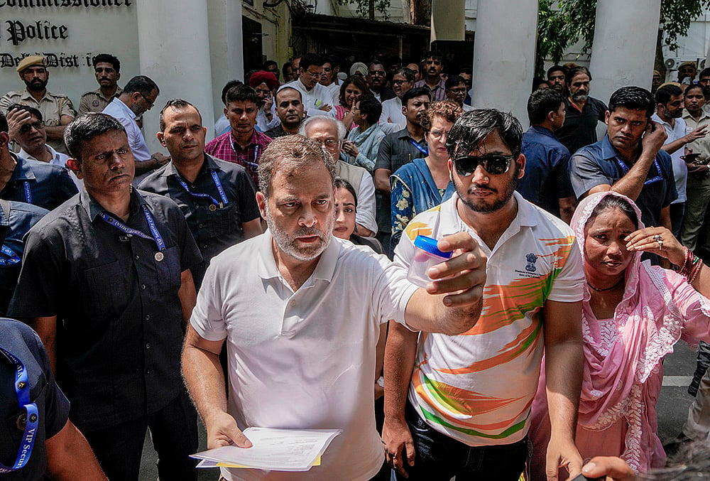 Rahul Gandhi with a youth who reportedly suffered pellet injuries during the July 20 student protests
 - File Photo| Photo: PTI/Ravi Choudhary