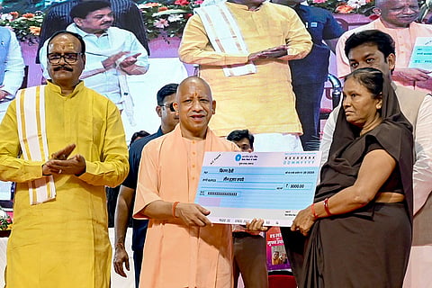 In this image posted on Aug. 23, 2026, Uttar Pradesh CM Yogi Adityanath during an event organized to honor the mid-day meal cooks working under the 'PM Poshan Yojana', in Lucknow. () (PTI08_23_2026_000205B)