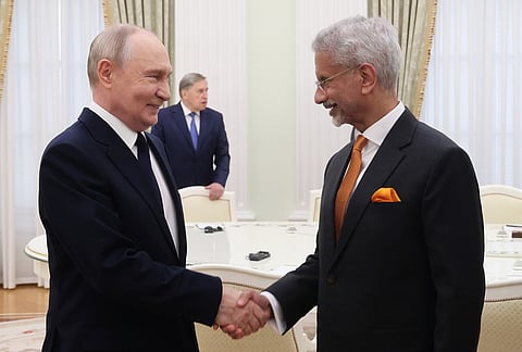 Russian President Vladimir Putin, left, and Indian Foreign Minister Subrahmanyam Jaishankar shake hands during their meeting at the Senate Palace of the Kremlin in Moscow.