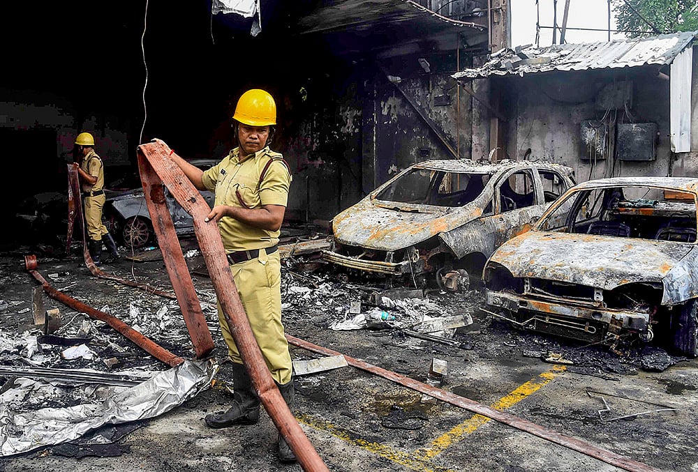 Fire breaks out at car showroom in WBs Madhyamgram