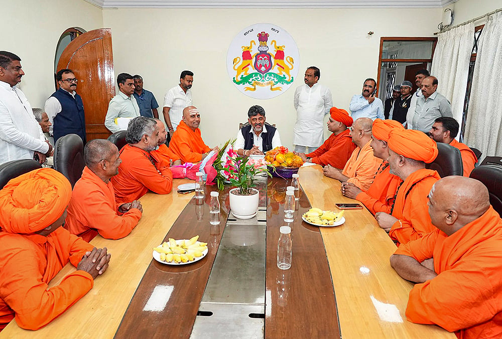 DK Shivakumar meets heads of mathas