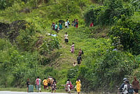 China Warns Nepal Of Imminent Glacial Lake Breach Risk After Deadly Flash Floods
| Photo: PTI/Nand Kumar : People move to safer locations after authorities issued a fresh flood warning following a rise in water levels in areas affected by a devastating flash flood earlier this week, in Dhading district, Nepal.