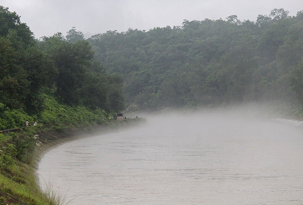 Mist rises over the Ganga after rainfall in Rishikesh