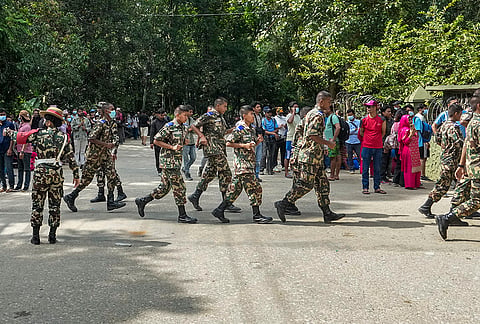 Nepal army officials at a camp as family members search for the names of their kin on a list of people rescued following devastating flash floods, in Trishuli, Nuwakot district, Nepal. The death toll from Wednesday's flash floods in Nepal has risen to 626, with nearly 2,500 people evacuated and more than 2,400 still missing as rescue teams continue search and relief operations. 