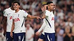 Tottenham Hotspur's Savio, right, celebrates scoring their side's fourth goal of the game duringthe Britain League Cup second round match against Charlton Athletic in London. - John Walton/AP Photo