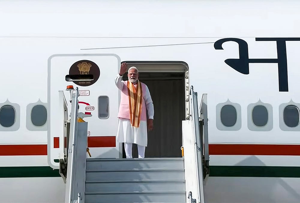 PM Modi emplanes for Uzbekistan