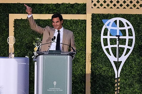 Roger Federer thanks the audience during his induction ceremony at the International Tennis Hall of Fame in Newport, R.I.