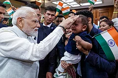 In this image received on Aug. 30, 2026, Prime Minister Narendra Modi being greeted by members of Indian community upon his arrival in Bishkek to participate in the 26th SCO Leadership Summit. - Photo: PMO via PTI