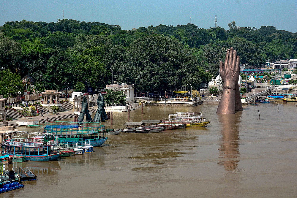Weather: Swollen Ganga river in Varanasi
