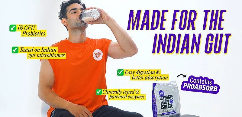 Man drinking protein shake with whey protein product pack