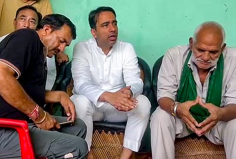 Union MoS Jayant Chaudhary meets family members of slain Haryanvi singer Ankit Balyan, after two suspected sharpshooters carrying a reward of Rs 50,000 each in the murder case of Balyan were killed in a police encounter, in Uttar Pradesh's Shamli.