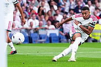 Mbappe And Bellingham Lead Real Madrid’s Four-Goal Rout Of Malaga | Photo: AP/Manu Fernandez : Real Madrid's Kylian Mbappe takes a shot during the La Liga soccer match between Real Madrid and Malaga in Madrid, Spain.