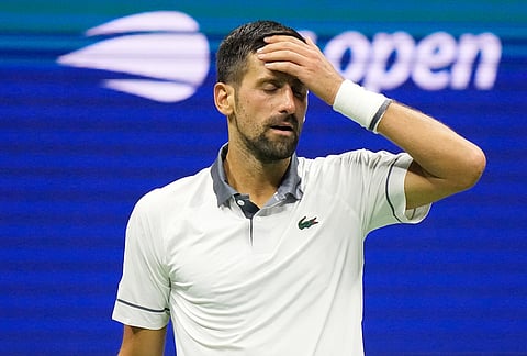 Novak Djokovic, of Serbia, reacts during the first round of the U.S. Open tennis championships against Mariano Navone, of Argentina, Sunday, Aug. 30, 2026, in New York. 