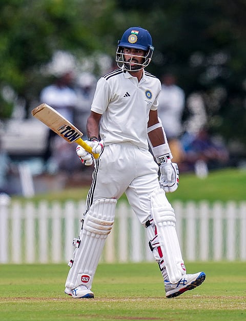 East Zone’s Abhimanyu Easwaran celebrates his half century during the Duleep Trophy Semi-final one, day two cricket match between Central Zone and East Zone, at BCCI Centre of Excellence (CoE) grounds, in Bengaluru.