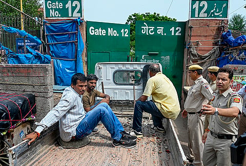 Police officials a demolition and encroachment removal drive, launched by the Municipal Corporation of Delhi (MCD) in the Jama Masjid area, following directions from the Delhi High Court, in New Delhi.