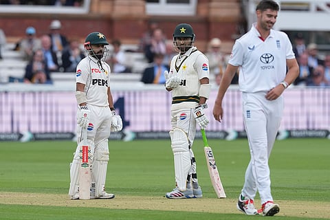 Pakistan's Saud Shakeel, left, reacts after hitting a six on a delivery by England's Josh Tongue, right, on day four of the second cricket test match between England and Pakistan in London.