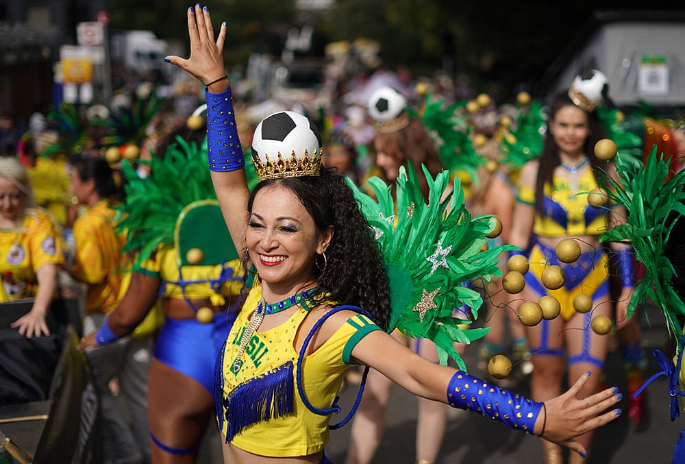 Revellers celebrate Notting Hill Carnival in London, Monday, Aug. 31, 2026, Europe's biggest street party and one of the largest carnivals in the world. - | Photo: AP/Alberto Pezzali
