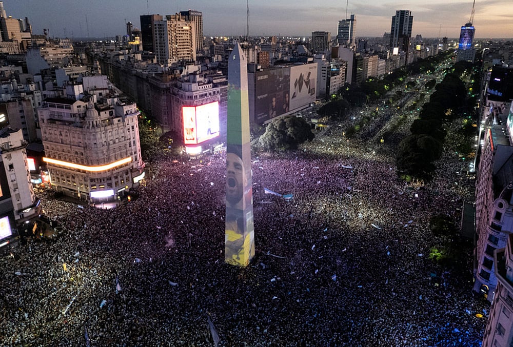 The face of Argentinas Lionel Messi is projected on the capitals Obelisk as fans celebrate their teams World Cup victory over France in Buenos Aires, Argentina, Dec. 18, 2022. 