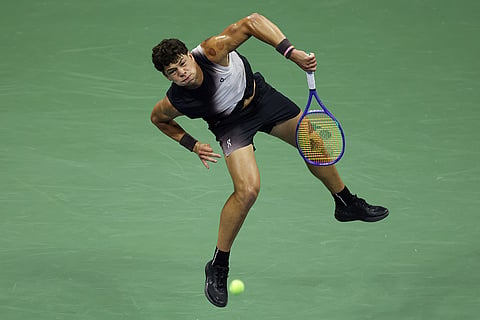 Ben Shelton, of the United States, serves the ball to Tallon Griekspoor, of the Netherlands, during the first round of the U.S. Open tennis championships in New York.