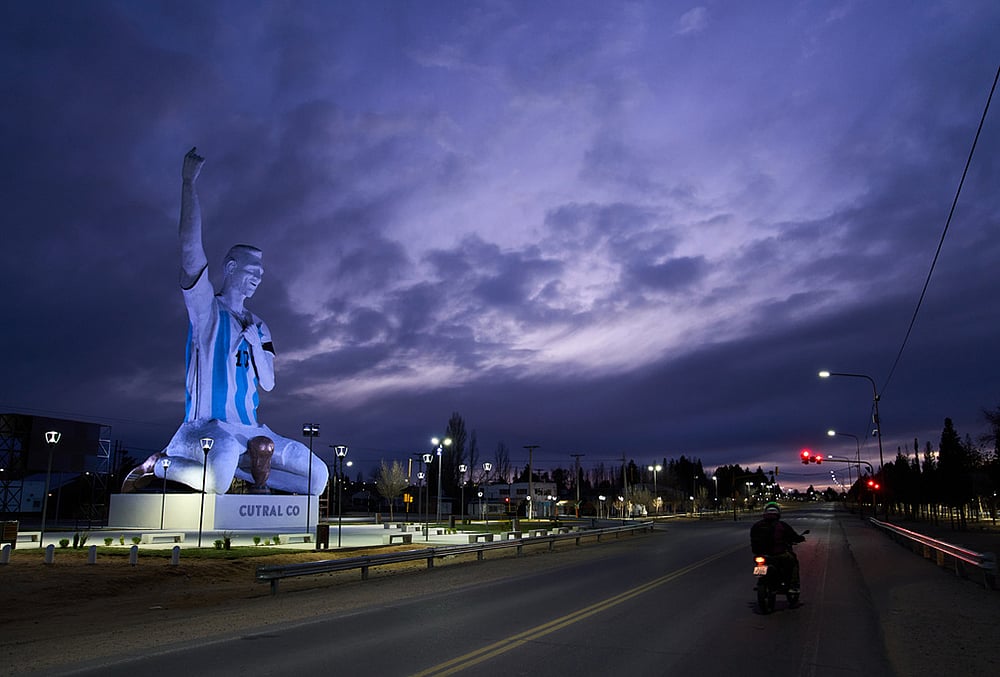 A sculpture of soccer star Lionel Messi by artist Aldo Beroisa, that was unveiled for Argentinas opening World Cup match against Algeria, stands in Cutral Co, Argentina, at sunrise, June 21, 2026.
