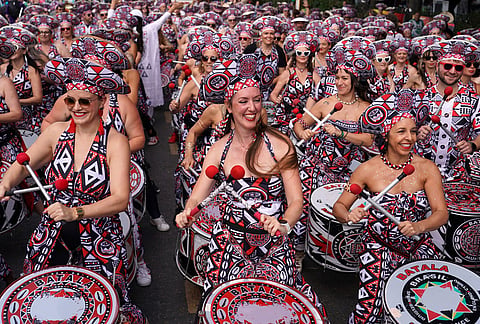 Revellers celebrate Notting Hill Carnival in London, Monday, Aug. 31, 2026, Europe's biggest street party and one of the largest carnivals in the world. 