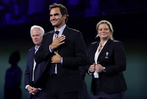 Roger Federer, former tennis player, gestures as he receives his Hall of Fame ring at the U.S. Open tennis championships Monday, Aug. 31, 2026, in New York. 

