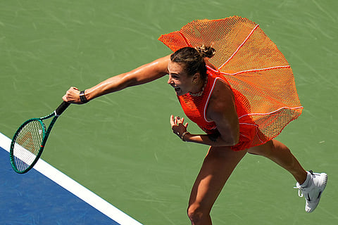 Aryna Sabalenka, of Belarus, follows through on a shot to Camila Osorio, of Colombia, during the first round of the U.S. Open tennis championships in New York.