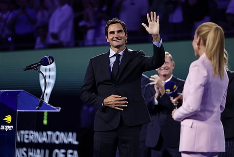 Roger Federer, former tennis player, gestures as he receives his Hall of Fame ring at the U.S. Open tennis championships Monday, Aug. 31, 2026, in New York. 
